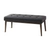 upholstered bench in black and cream faux leather